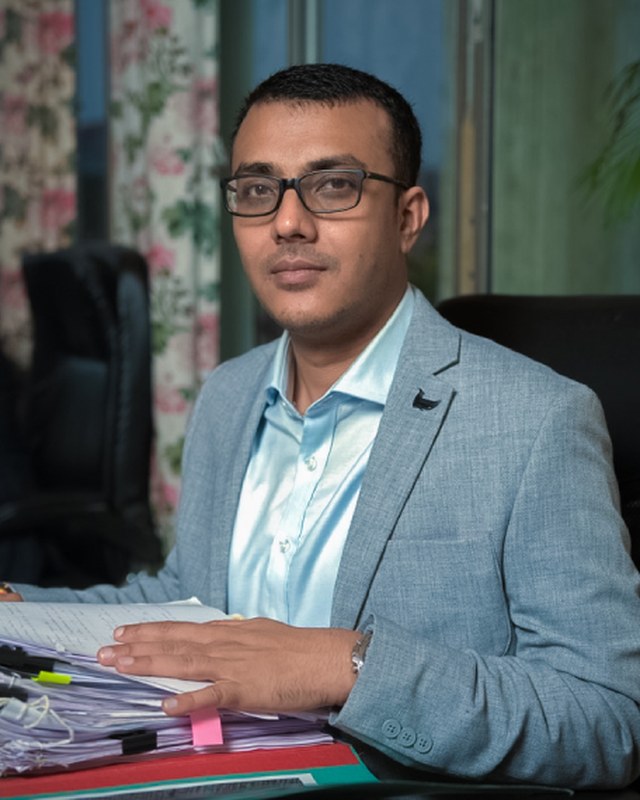 Advocate Sandeep Mitra at his desk